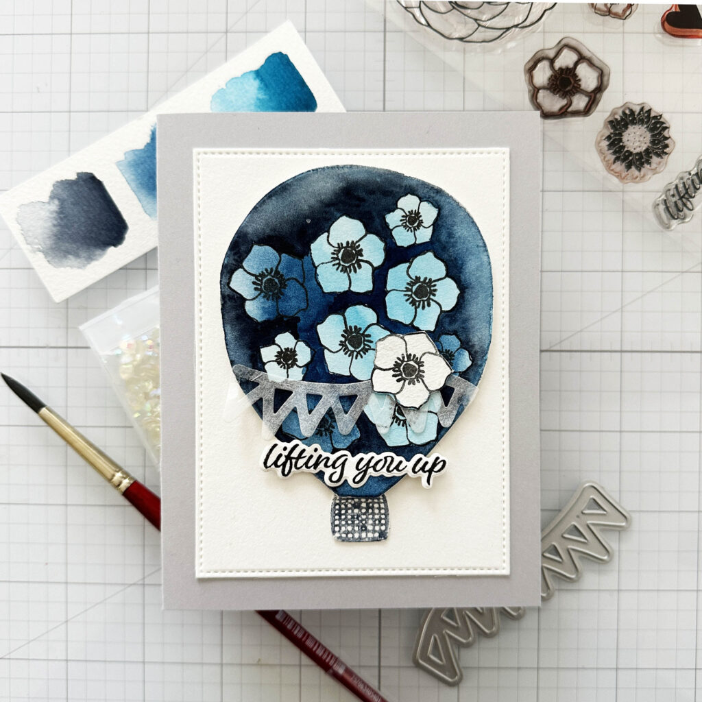 Image of a card using the negative watercolor technique